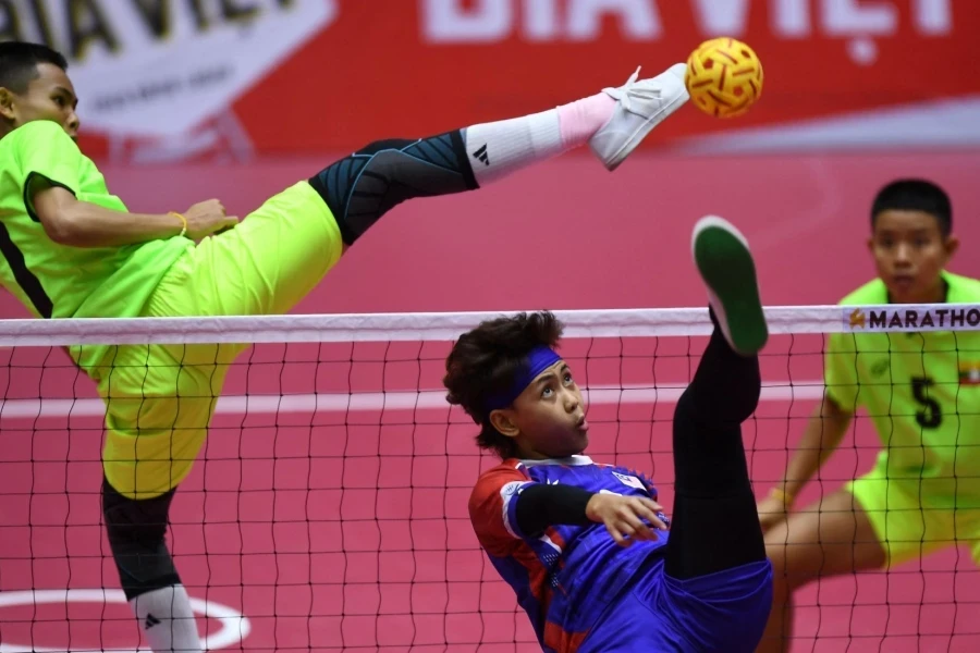 Southeast Asian players playing sepak takraw