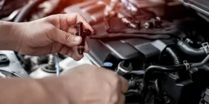 Technician use wrench removing the gasoline injector part on engine maintenance concept check and service