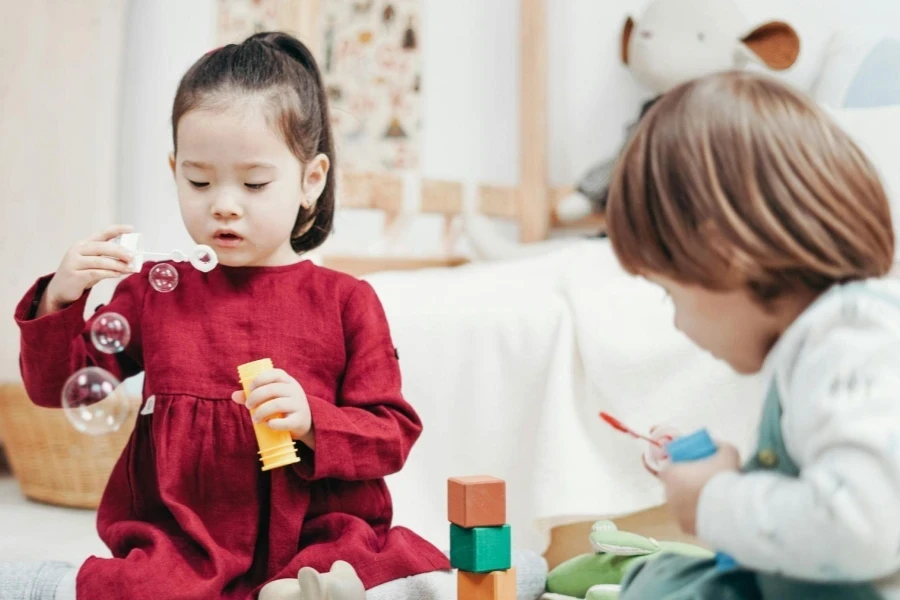 Toddlers playing indoors