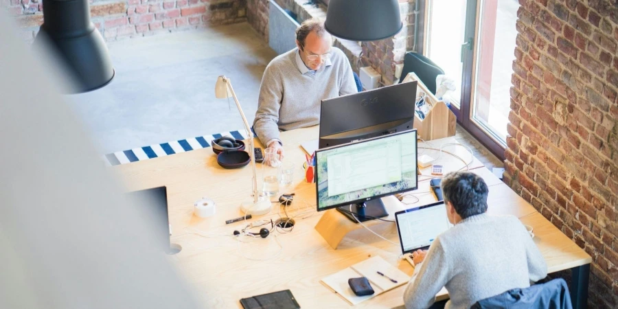 Two Men Working in front of Computers