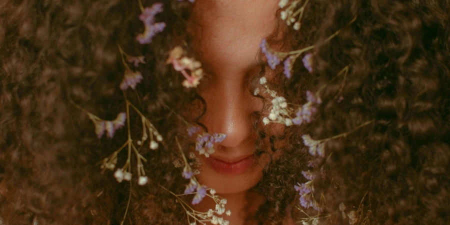 Unrecognizable Woman with Curly Brown Hair