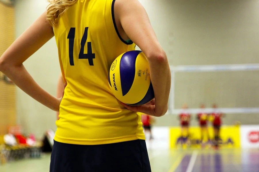 Volleyball player holding a ball