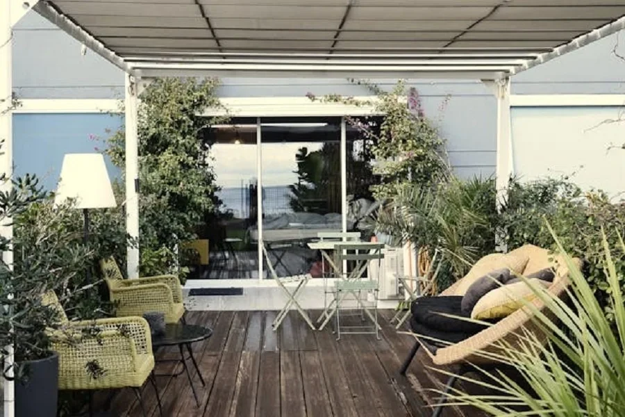 Wicker seats and tropical plants on a patio