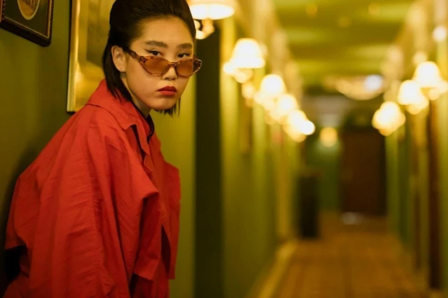 Woman in Red Dress Wearing Brown Framed Sunglasses