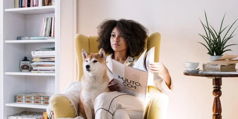 Woman reading a magazine in white bamboo pajamas
