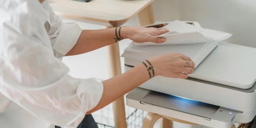 Woman using printing machine