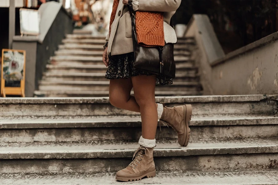 Woman wearing short boot cuff leg warmers