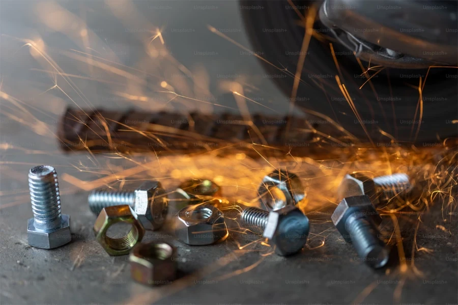 a bunch of nuts and bolts on a table