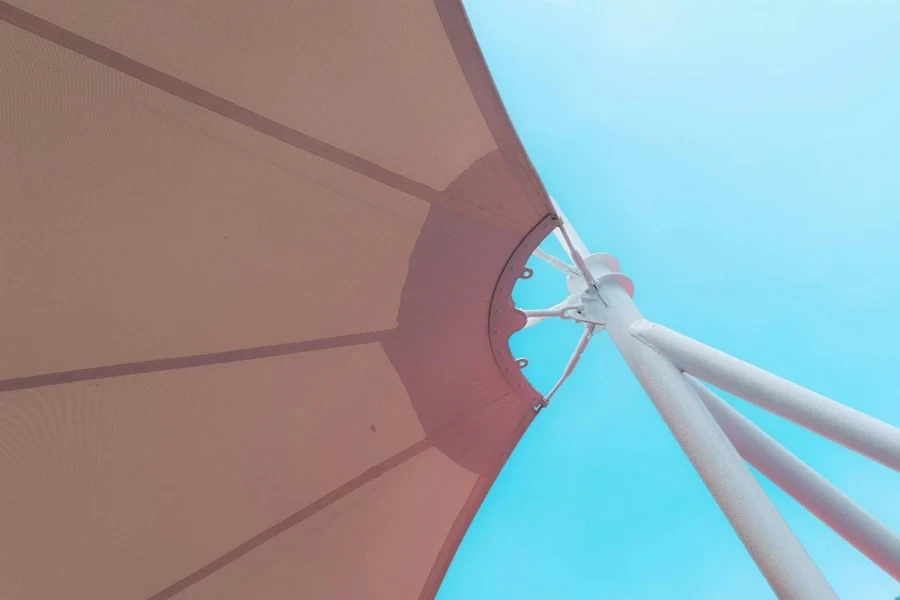 a close up of a large umbrella on a sunny day