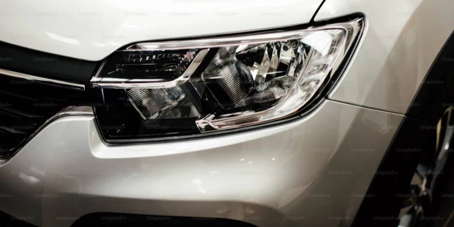 a close up of the front of a white car