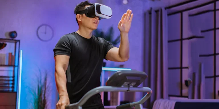 a gamer on a VR treadmill with visor