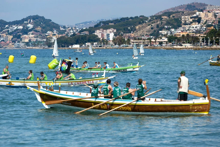 group of people riding boat at day time