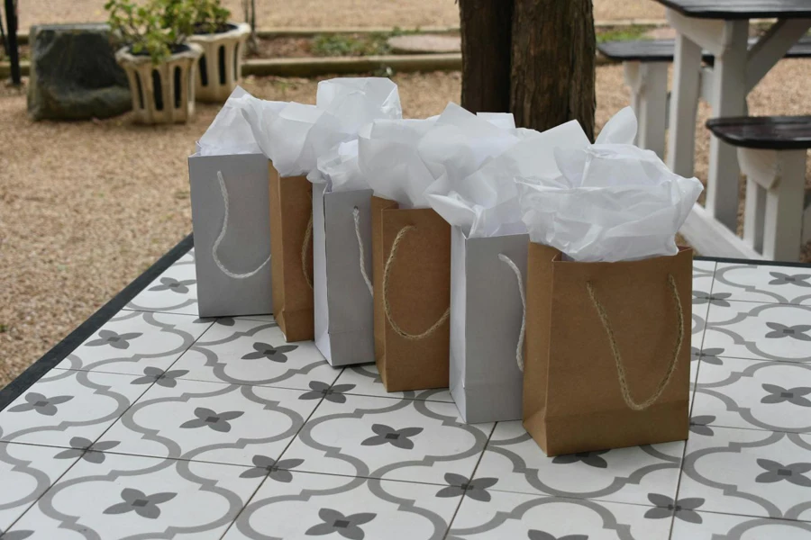 multiple plain gift bags in grey and brown color