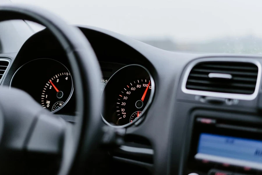 A Car Dashboard with focus on speedometer