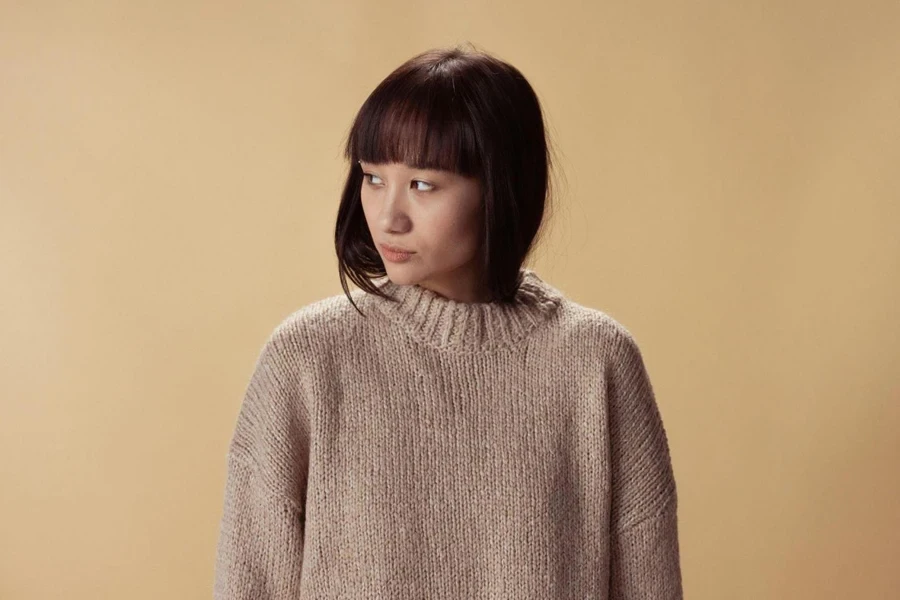 A Woman in Beige Sweater