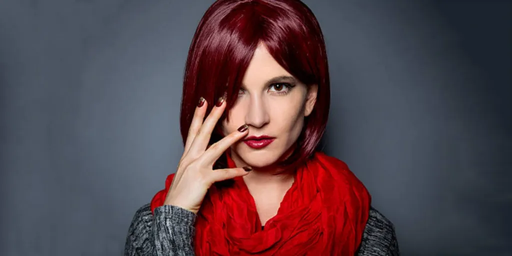 A beautiful woman rocking a burgundy wig