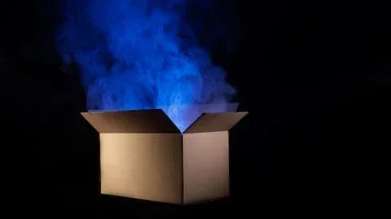 A cardboard box with a blue flame