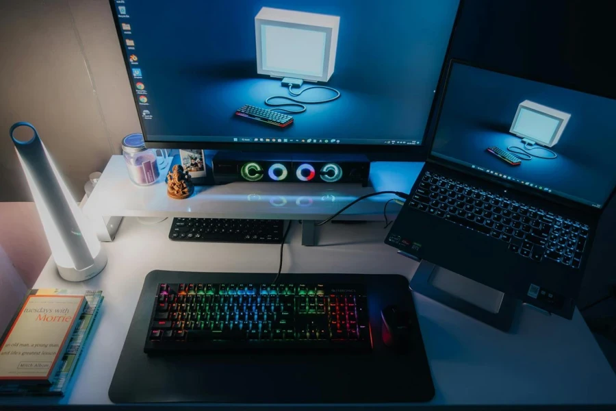 A computer desk with a keyboard, mouse and monitor