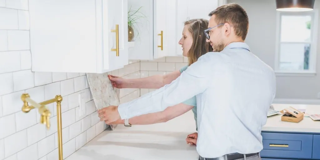 A couple picking backsplash for their kitchen