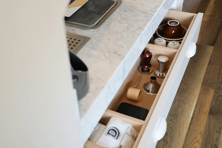 A drawer with objects in it