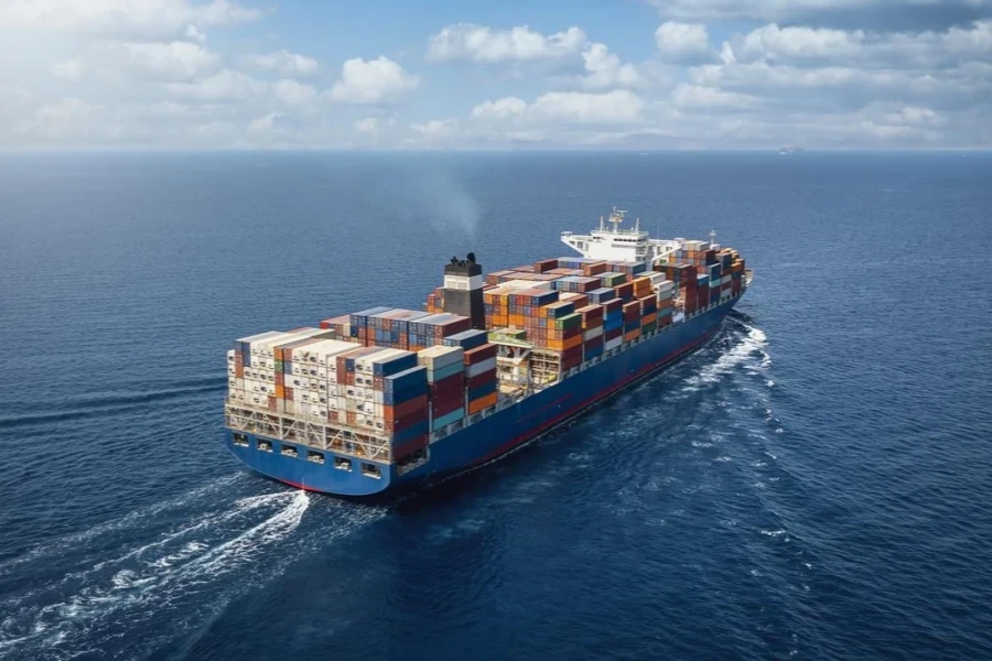 A large container cargo ship in motion