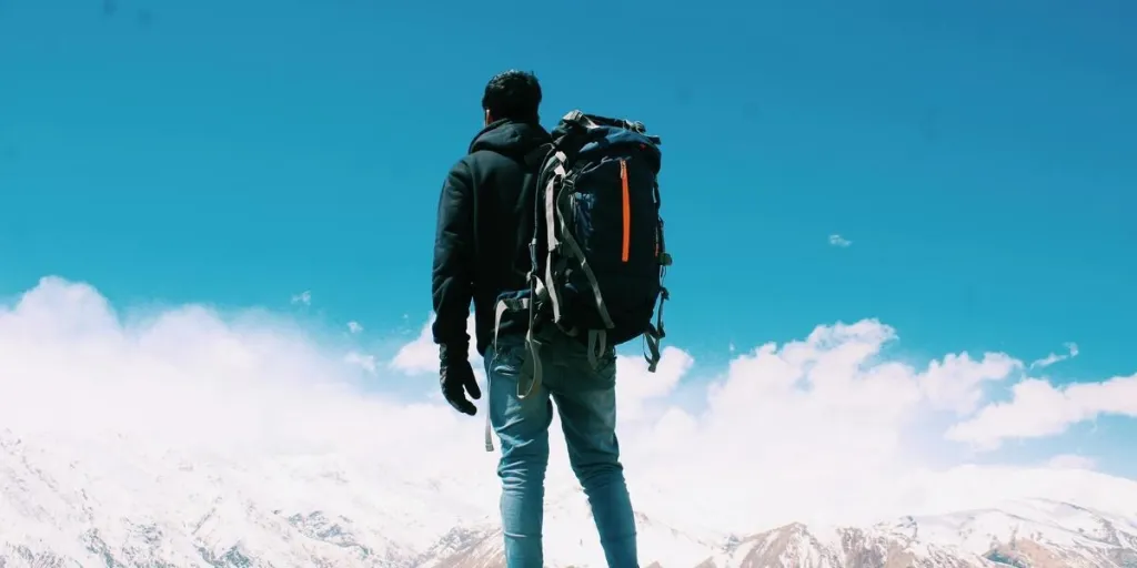 A man carrying a daypack