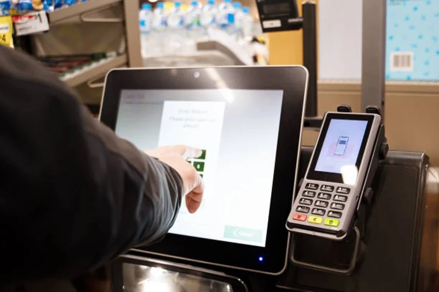 A self-checkout machine with an EFT pos