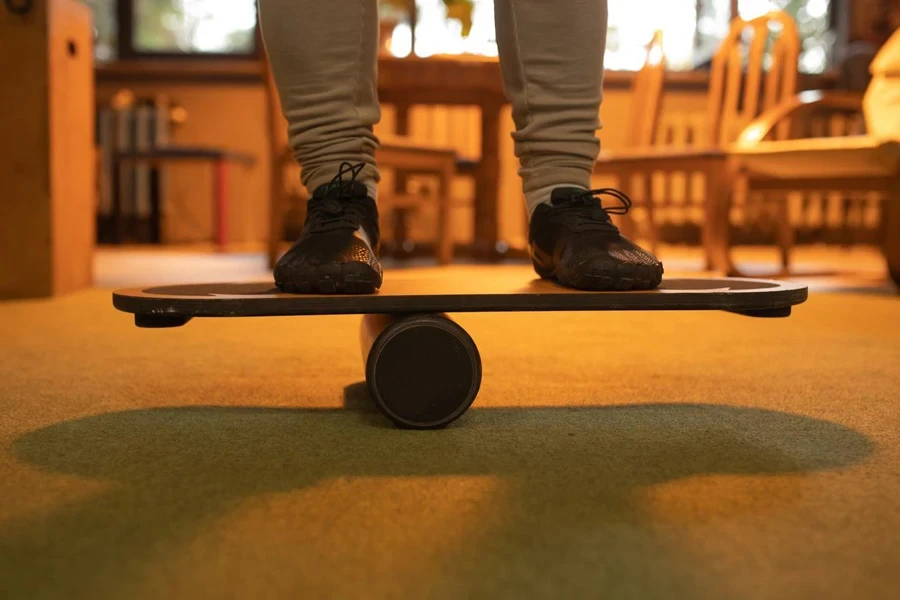 Athlete training with balance board for sports