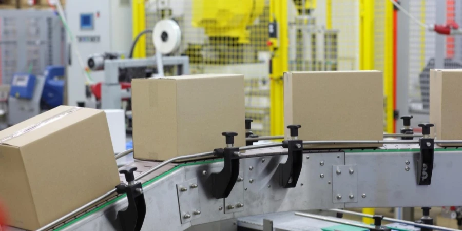 Automation - cardboard boxes on conveyor belt in factory