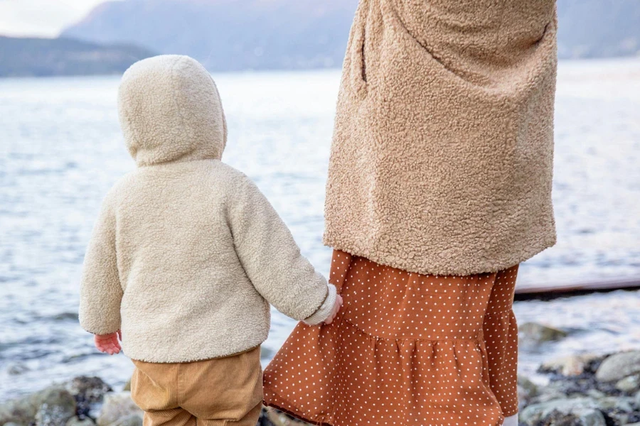 Baby and Woman Standing