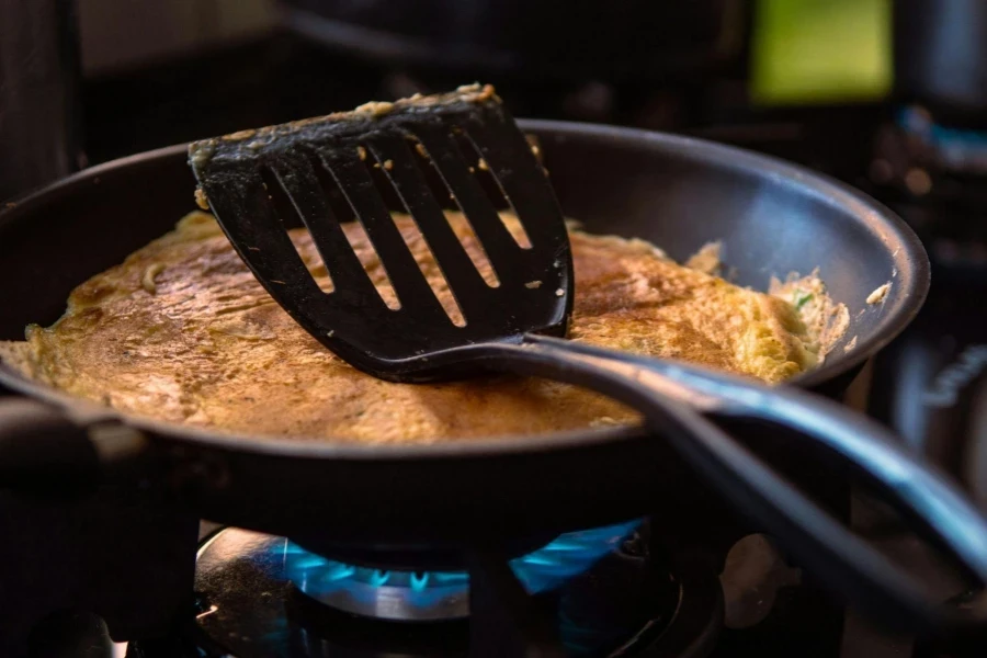 Black Spatula on Black Frying Pan