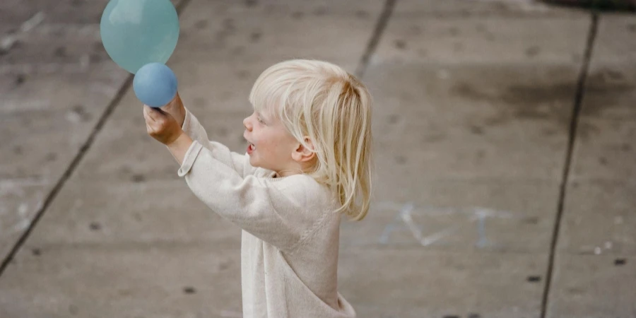 Boy Playing Balloons