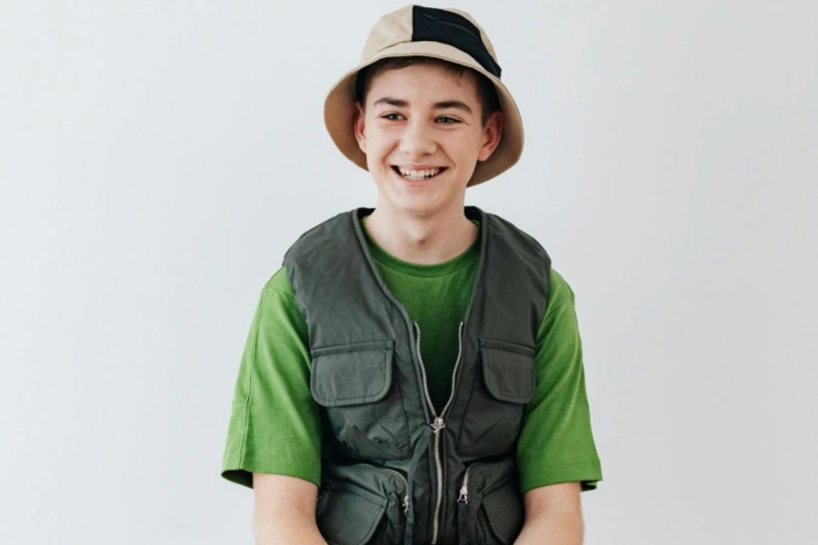 Boy Wearing a Vest and a Bucket Hat