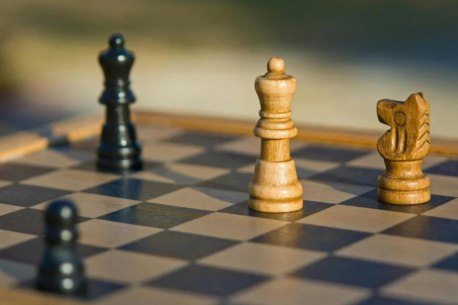 Brown and Black Wooden Chess Piece