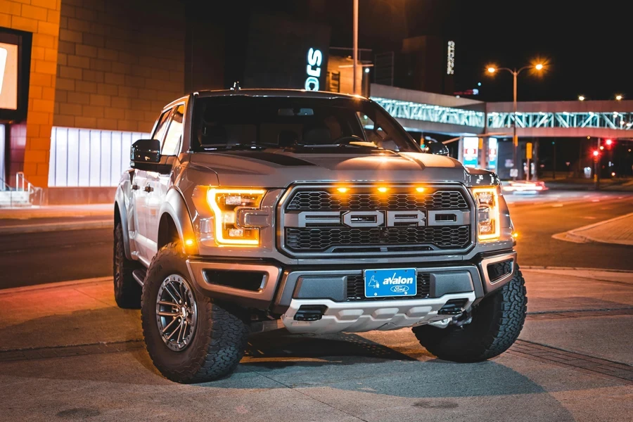 Car parked on city street at night