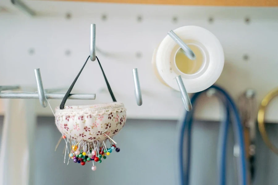 Close-Up Photo of a Pincushion Hanging