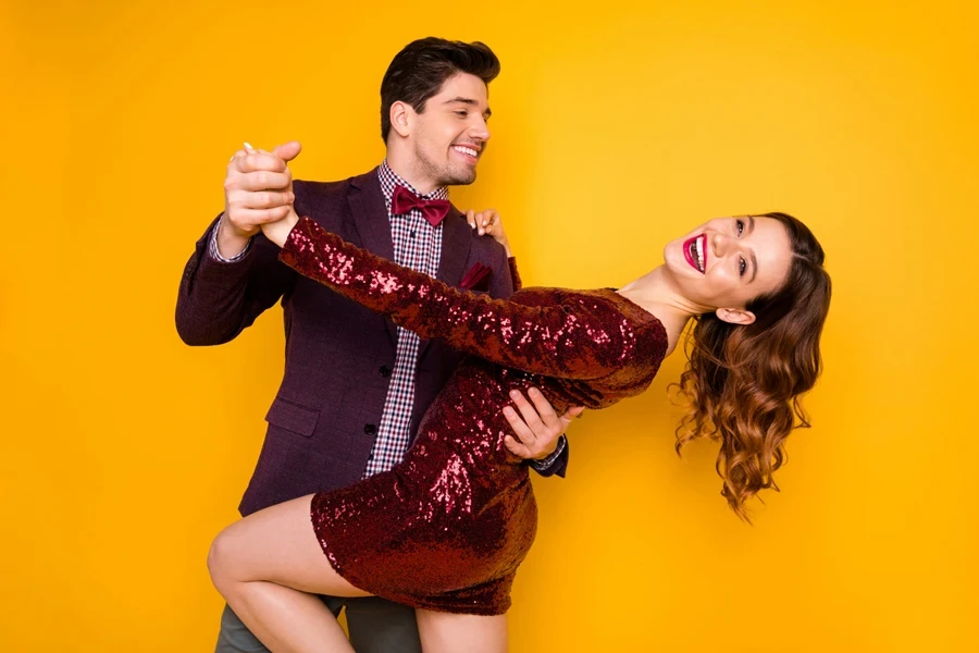 Dancing couple in cocktail attire