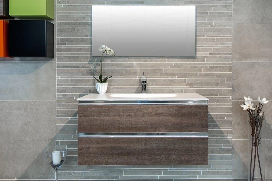 Floating vanity against a tiled wall complemented by a mirror