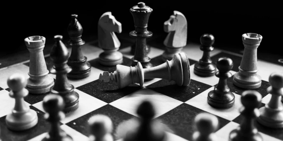 Grayscale Photography Of Chessboard Game