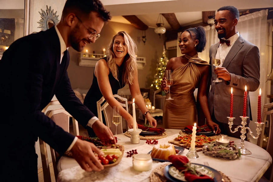 Group of people in formal Christmas dinner attire