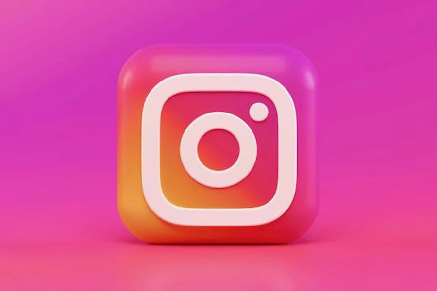 Instagram logo on a pinkish purplish background