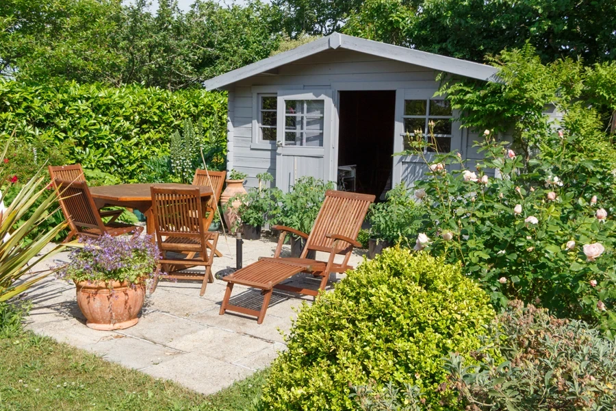 Large garden shed with outdoor sitting area