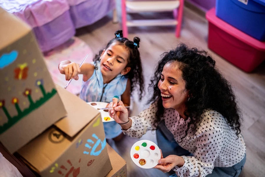 Mother doing a fun activity with her daughter