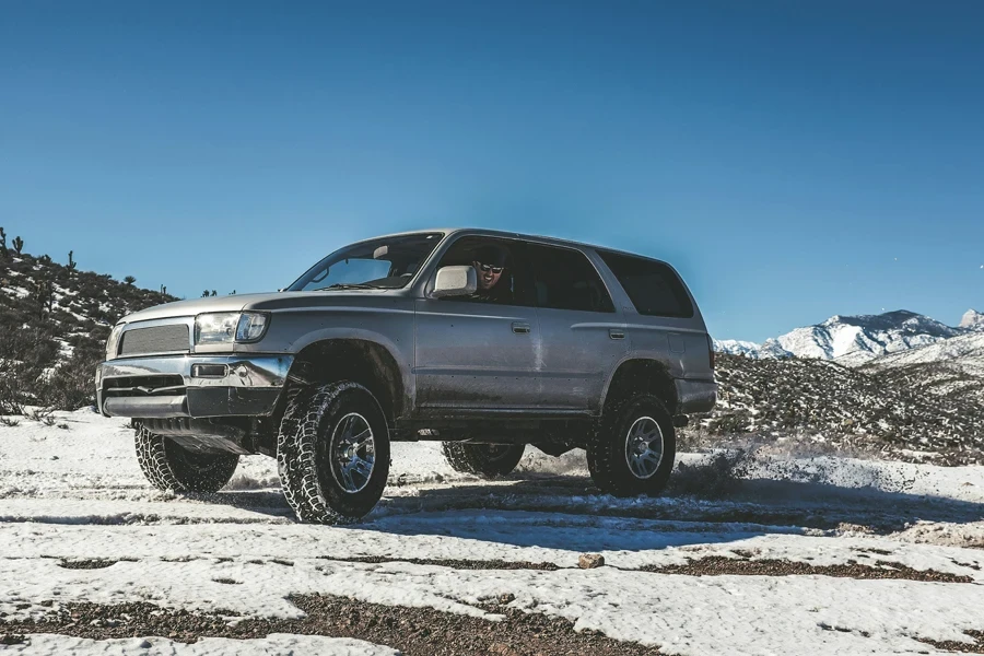 Off Road SUV on snowy mountain