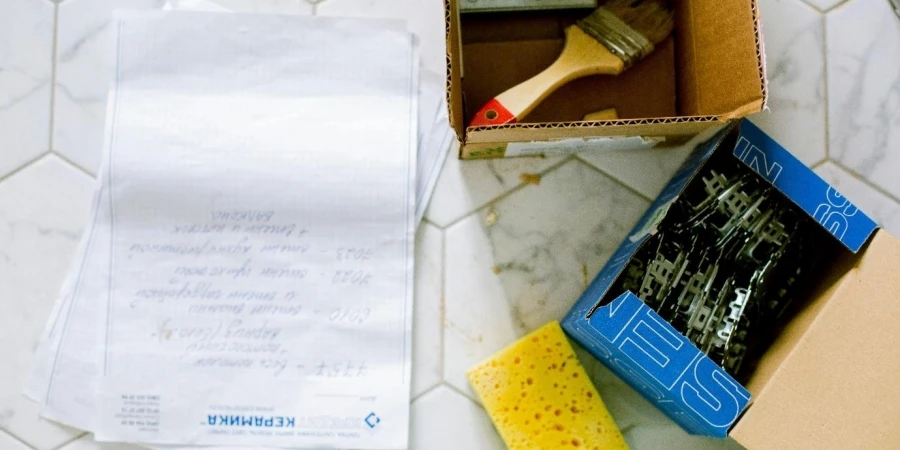 Papers, Sponge and Boxes on the Floor