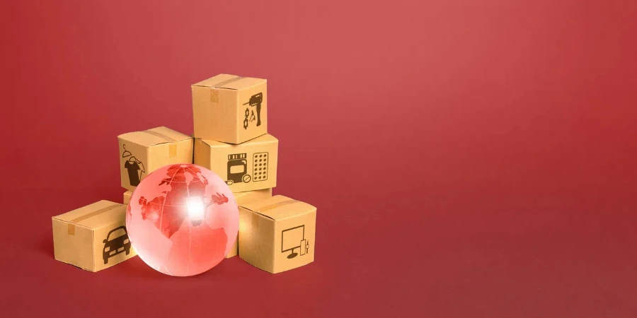 Red glass globe and cardboard boxes