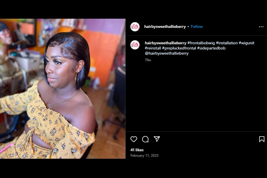 Screenshot of a gorgeous black woman rocking a side-parted bob