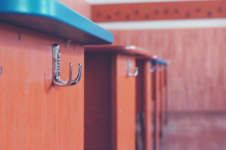 Selective Focus Photography of a Metal Hook Screwed on a Wall