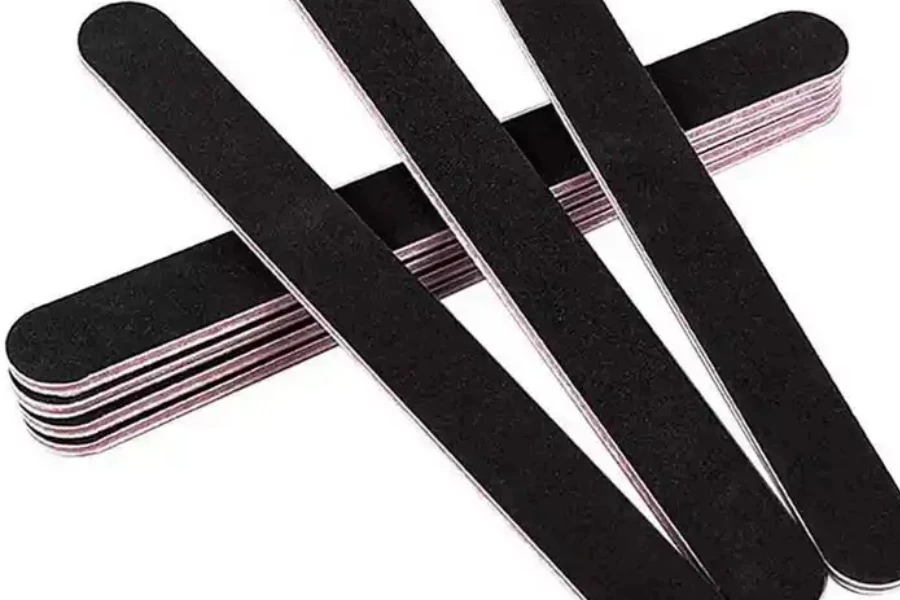 Several nail files lined up on a white background