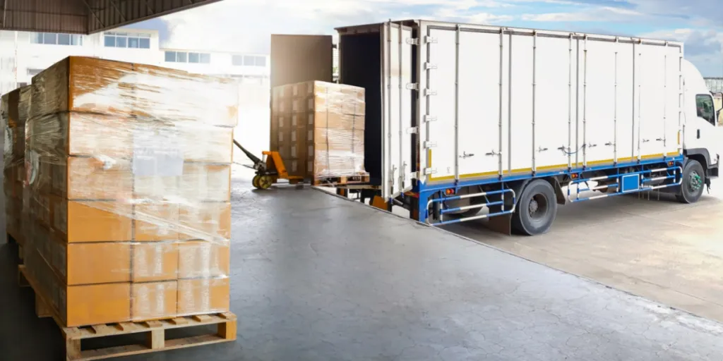 Shipping company loading packages into a truck